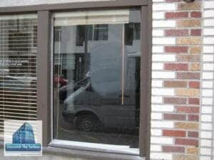 scratched glass graffiti removal - Santa Monica CA