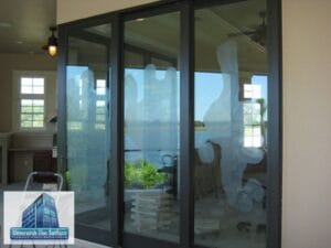 Sanding and buffing scratches out of tempered glass sliding door in sunny Brandon, FL
