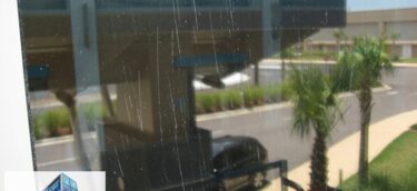 closeup view of widespread scratches in hurricane laminated glass biloxi ms Closeup of scratches throughout tempered laminated hurricane window in biloxi MS