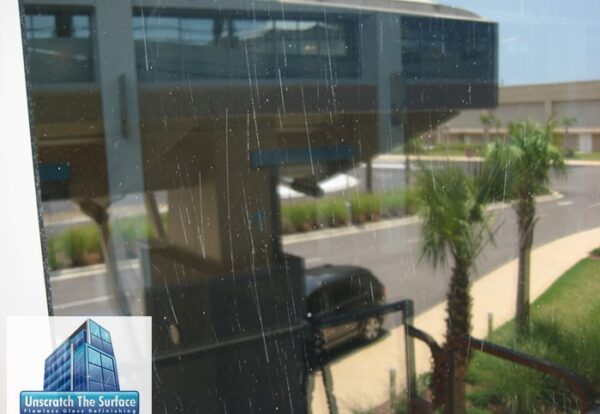 Closeup of scratches throughout tempered laminated hurricane window in biloxi MS