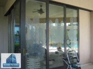 Grinding step for saving scratched sliding doors in Brandon, FL.