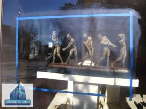 removing glass scratches restores the view to these sculptures