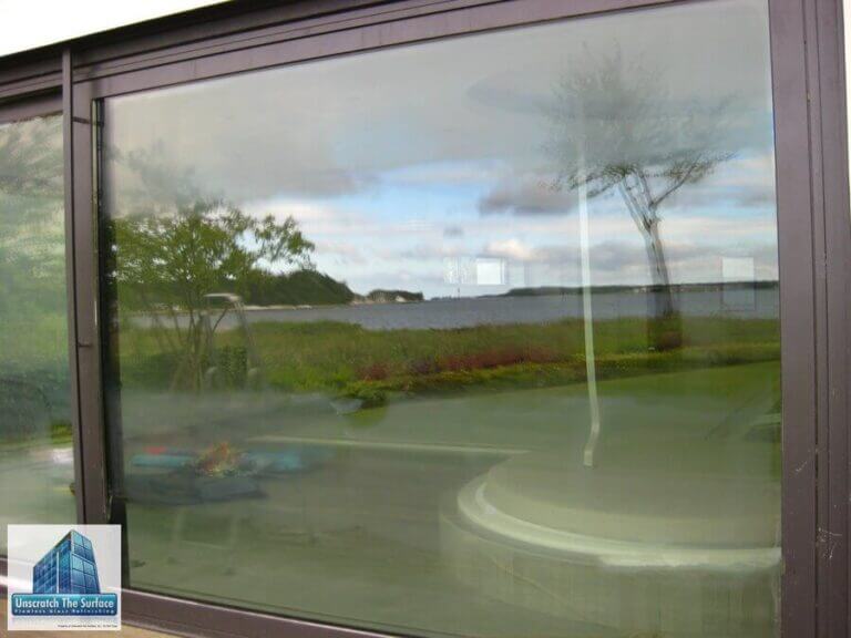 Glass Resurfacing Germany - Custom Waterfront Home Getting more scratches out of glass. This is the step to polish out the haze. Kiel, Germany