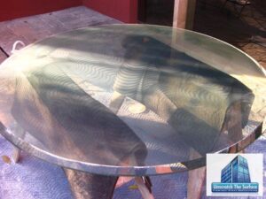Step one is to remove all scratches from glass table top before polishing. Bel Air, CA