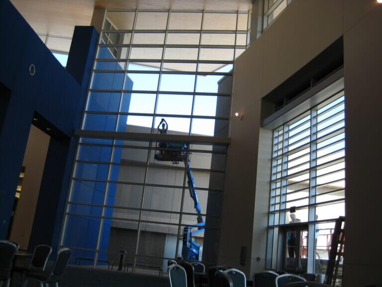 7,000 Sq Ft of Scratched Hurricane Glass Restored - Biloxi MS The Unscratch crew getting scratches out of glass in Biloxi, MS