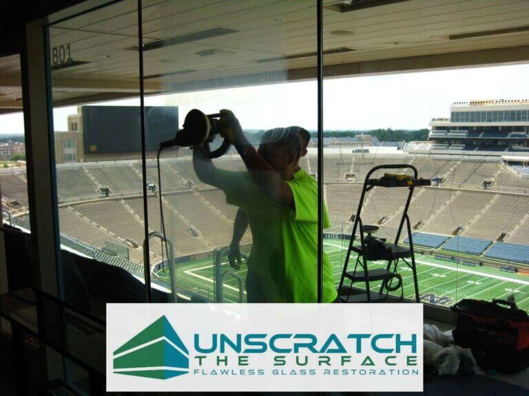 Training new glass scratch remover at football stadium scratched glass project. This was in South Bend, IN.